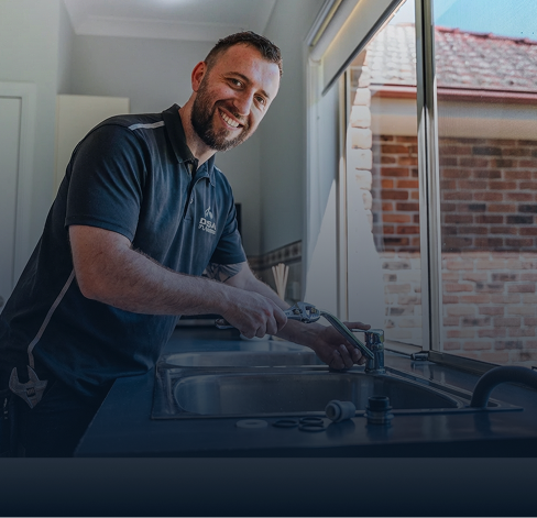 DYLSAL plumber repairing a burst pipe section with stocked van parts